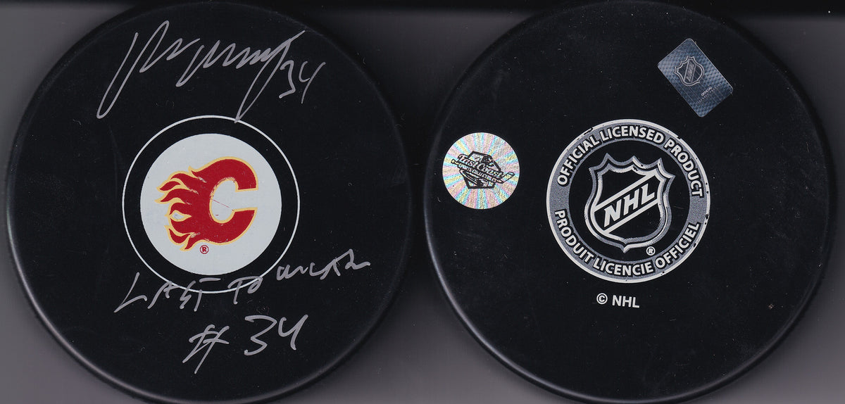 Miikka Kiprusoff Signed Calgary Flames Puck  with Inscribed "Last to Wear  #34" with COA autographed auto